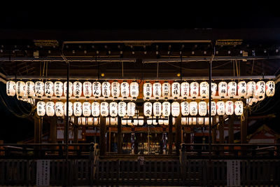 Low angle view of illuminated building at night