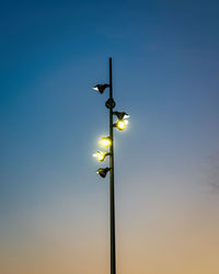 Low angle view of windmill against clear sky