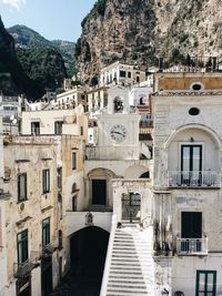 Buildings against mountains at amalfi coast