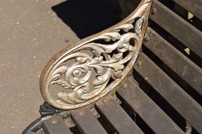 High angle view of rusty metal on wood in city