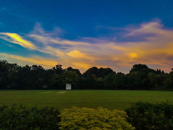Scenic view of landscape against sky during sunset