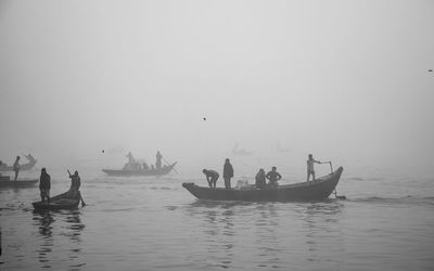 People swimming in sea