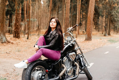 Portrait of woman riding motorcycle