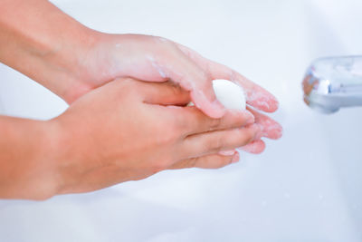 Close-up of hand holding hands