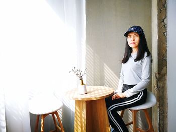 Portrait of woman sitting in cafe