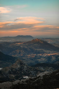 Aerial view of landscape against sky during sunset