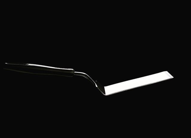 studio shot, copy space, still life, black background, close-up, single object, indoors, no people, metal, dark, music, high angle view, musical instrument, table, part of, simplicity, black color, shadow, technology, handle