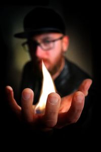 Close-up portrait of man wearing hat