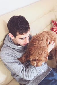 Woman with dog at home