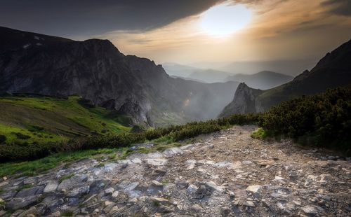 Scenic view of landscape against sky during sunset