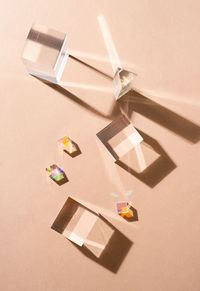 Abstract composition with glass prisms and cubes, long shadows