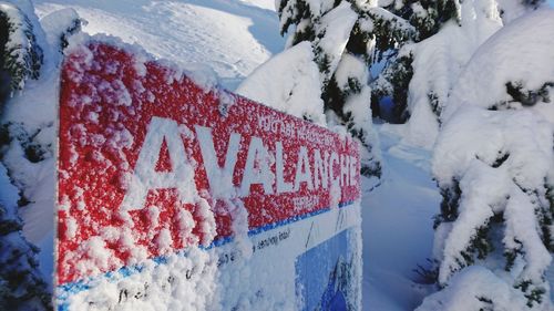 Text on snow covered landscape