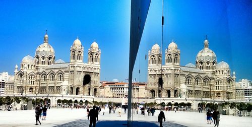 Tourists in front of building