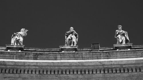 Low angle view of statue against sky