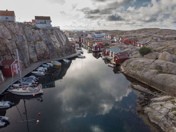 Panoramic view of canal and buildings against sky