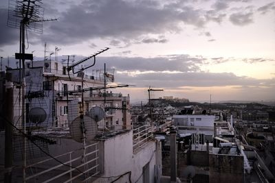 High angle view of buildings against sky during sunset