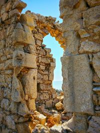 Damaged stone wall