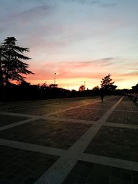 City against sky at sunset