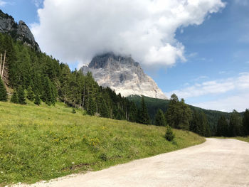 Scenic view of landscape and mountains against sky