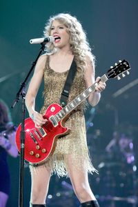 Young woman playing guitar