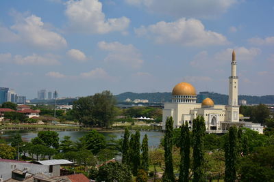 View of temple against cloudy sky