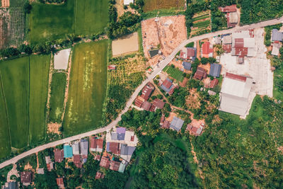High angle view of canal amidst buildings in city