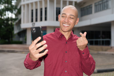 Young man using mobile phone