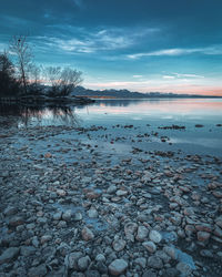 Scenic view of frozen lake against sky