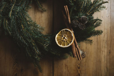 Christmas wreath on wooden background