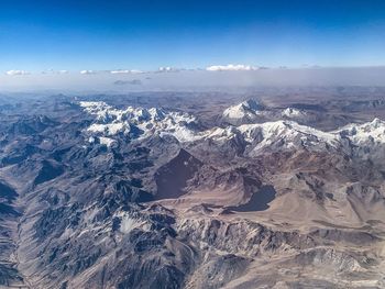 Aerial view of dramatic landscape against sky