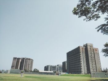 View of skyscrapers against clear sky