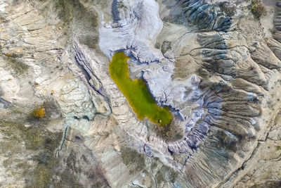 Aerial view of lake amidst dramatic landscape