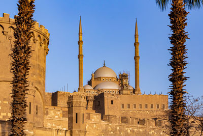 Low angle view of mosque against sky