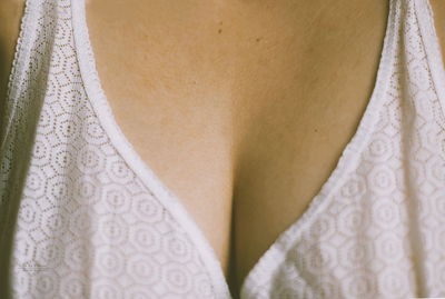 Midsection of woman wearing bra