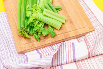 High angle view of chopped vegetables on cutting board