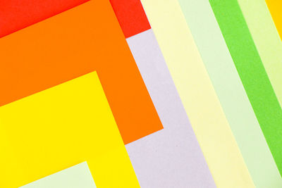 High angle view of multi colored paper on table