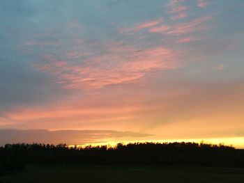 Scenic view of dramatic sky during sunset