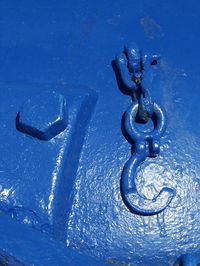 High angle view of hook on boat during sunny day