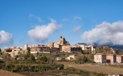 Buildings against blue sky