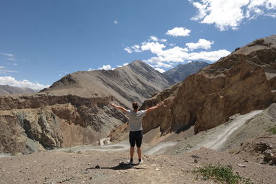 Man standing on rock formation