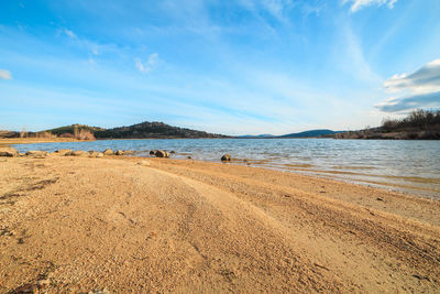 Scenic view of beach against sky