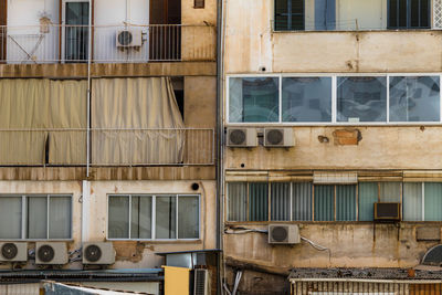 Cool, grungy apartment building exterior with symmetry and leading lines in spain