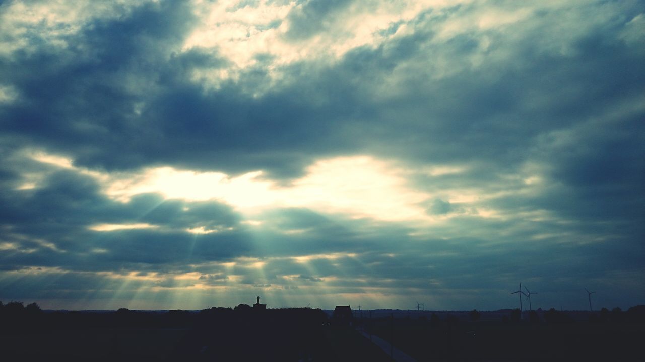 sky, cloud - sky, silhouette, cloudy, sunset, cloud, scenics, beauty in nature, tranquility, tranquil scene, weather, nature, dramatic sky, landscape, cloudscape, low angle view, overcast, dusk, outdoors, storm cloud