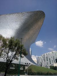 Low angle view of modern buildings against sky