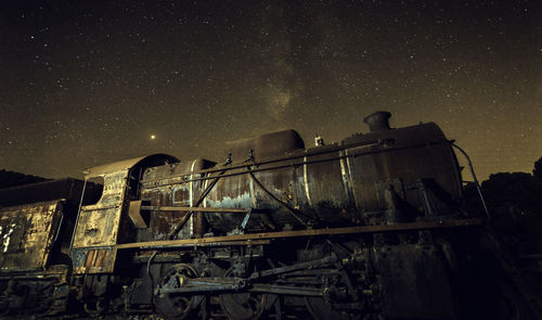 Old locomotive with and milky way