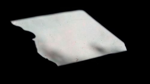 Close-up of over black background