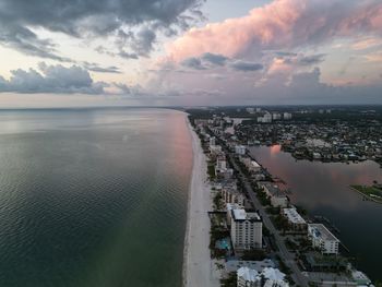 High angle view of city at sunset