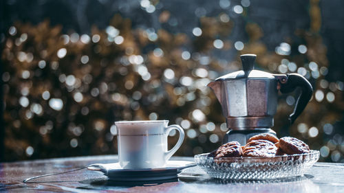 Close-up of coffee cup on table