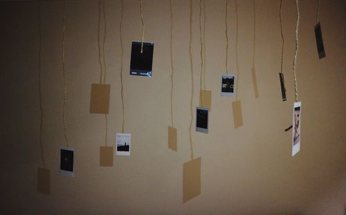 Close-up of computer hanging at home