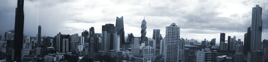 Panoramic shot of cityscape against sky